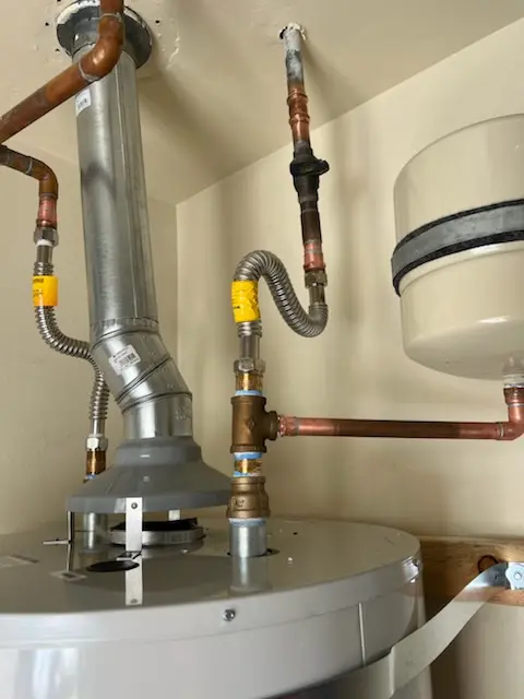 Water heater installation and plumbing repair in Norman